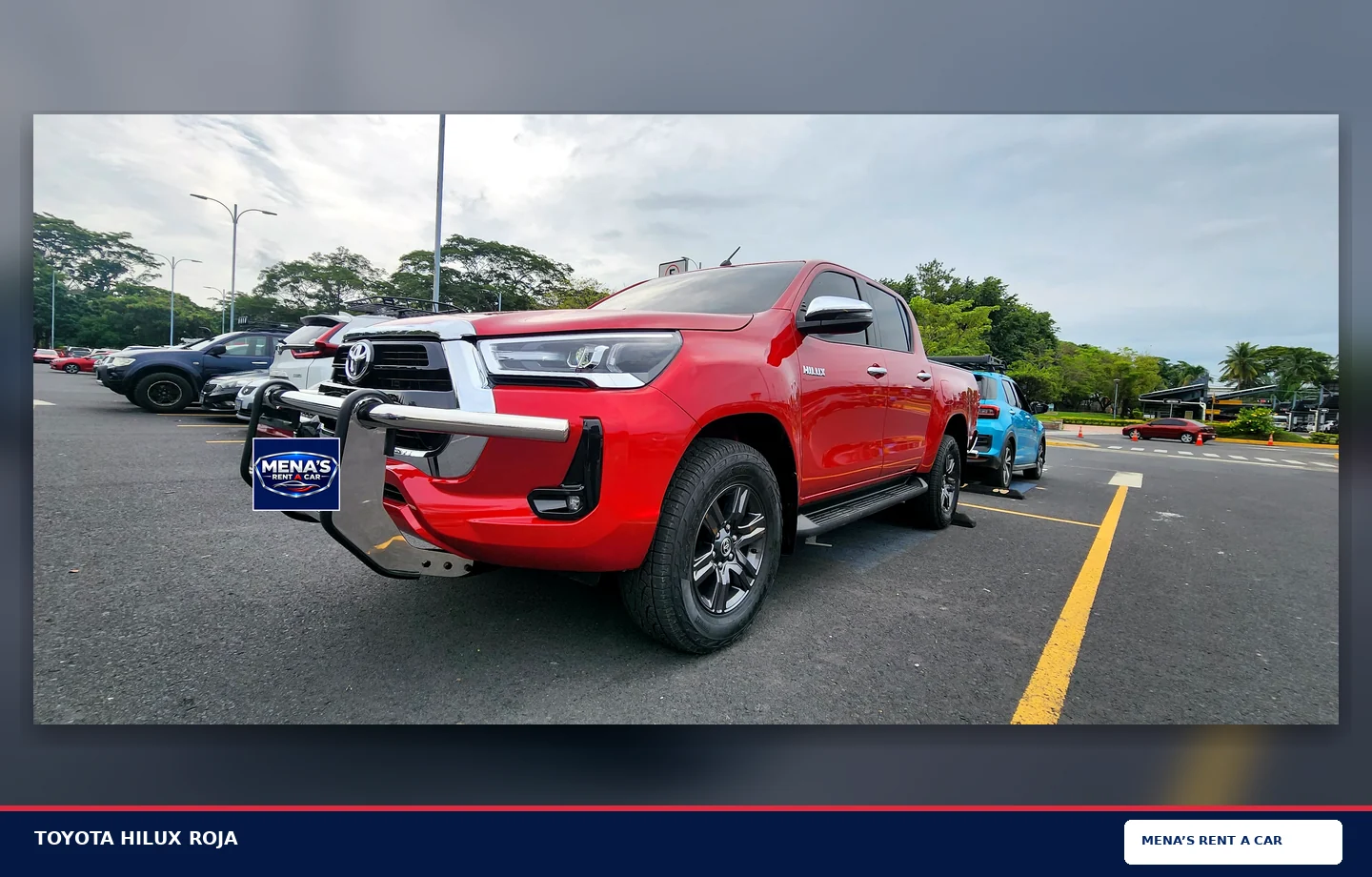 Photo of Red Toyota Hilux shared for Mena’s rental fleet